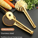Two golden stainless steel multifunctional frying tongs displayed on a black surface. One features a perforated skimmer head with round and oval holes, while the other showcases a mesh strainer basket with a serrated edge for secure gripping. Both have long, glossy handles, surrounded by fresh vegetables—corn, carrots, cilantro—and are captioned with the text: “STANLESS STEEL – Stainless steel – Multifunctional frying tongs,” emphasizing versatility and premium design -1600003112383 13034147.