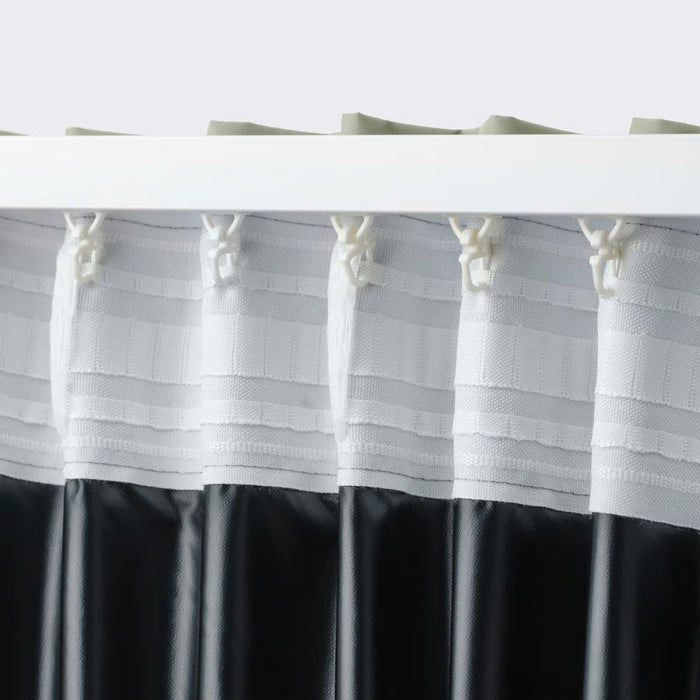 BENGTA block-out curtain, green, 210x250 cm. Light green top with black bottom, white fabric loops create pleats on rod – blocks light and adds contrast – 60602164.