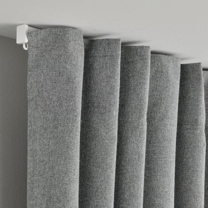 Close-up of gray curtains with a neutral background