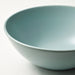Light blue ceramic bowl on a white background
