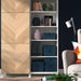 Living room shelving unit with multiple KUGGIS boxes in use for organizing books, binders, and decor items
