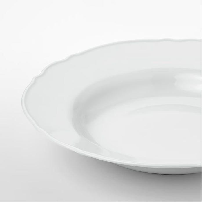 IKEA UPPLAGA deep plate, white, 26 cm (10 inches), featuring a scalloped edge and glossy finish—sleek design ideal for serving soups, pasta, and elegant dining setups.-30424719