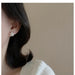 Digital Shoppy High-grade Ear Studs, worn on ear with elegant floral design and clear gemstones