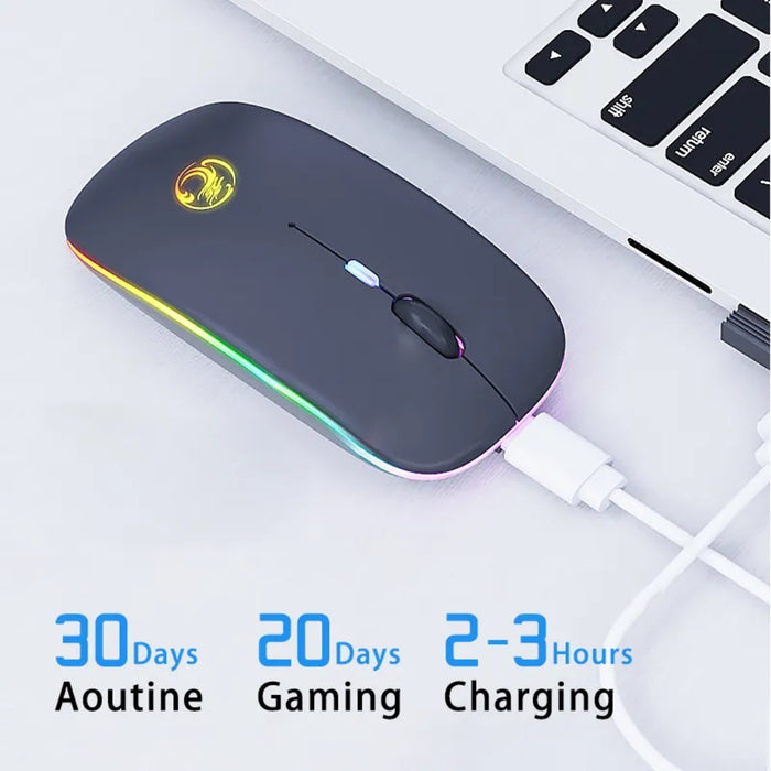Gaming mouse with RGB lighting on a white background, connected to a laptop.