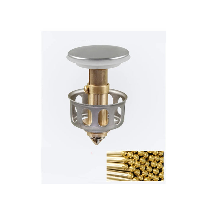Metallic device with a small inset of gold balls on a white background