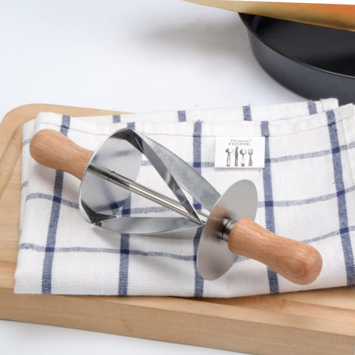 Wood-handled spiral pastry cutter placed on checkered cloth and cutting board – ideal for shaping dough and creating decorative cuts – 553248 13955755