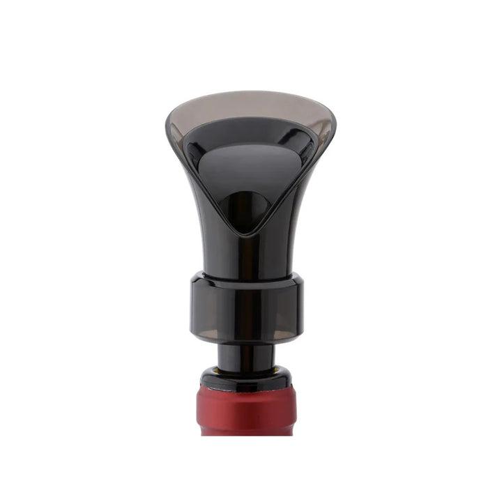 Black and red valve stem cap on a white background