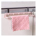 Compact pink foldable rack for organizing kitchen towels, gloves and cooking utensils