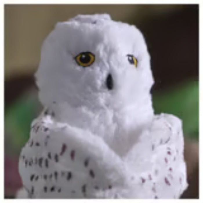 IKEA SKOGSDUVA soft toy – close-up of snowy owl puppet with black-speckled feathers and yellow eyes, white background - 50576896

