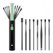 Set of black makeup brushes with a green handle on a white background