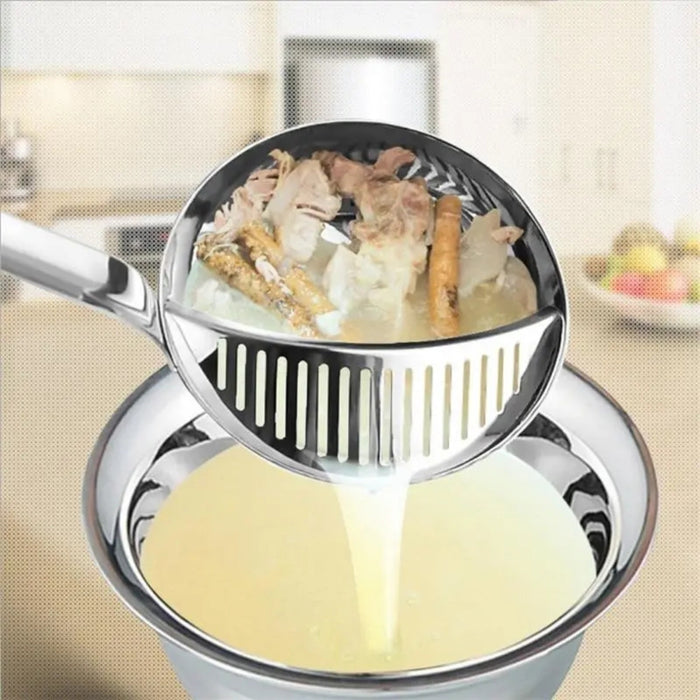 Sieve with food being strained over a bowl in a kitchen setting