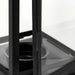 Close-up of a black metal frame with glass panels on a white background