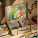 IKEA SANDLÖPARE storage trunk – open safari-themed trunk with chameleon art, animal cards, and kids’ art supplies – 10603217

