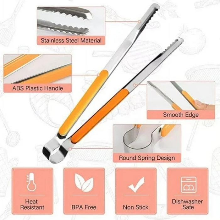 Stainless steel tongs with serrated edges gripping crispy fried chicken – placed on white plate over wooden surface