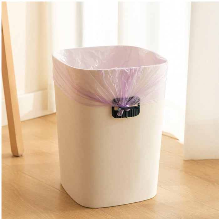Digital Shoppy 4 Anti-slip Fixers For Household Garbage Bags, black clip with purple accent securing liner on white trash bin