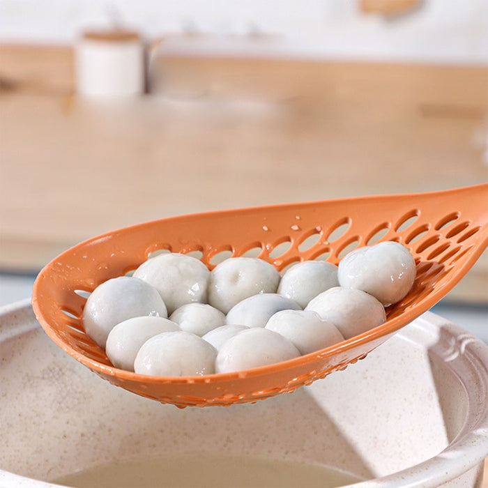 durable plastic filter spoon close‑up showing wide slots