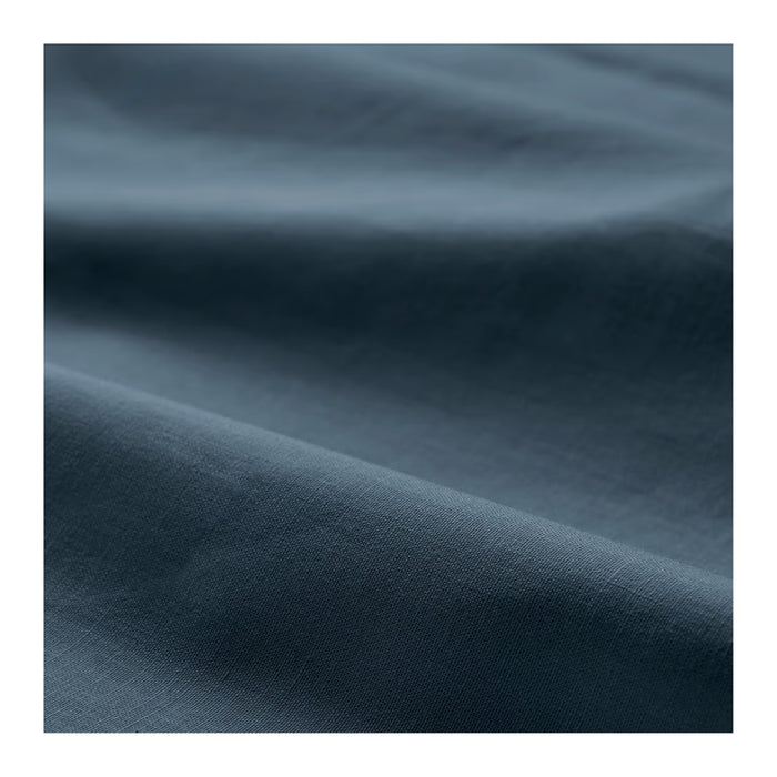 Close-up of dark blue fabric with visible texture