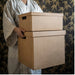 IKEA GÄRDESGÅRD storage box – person in robe holding two stacked boxes with black handles, bamboo wallpaper-80596954