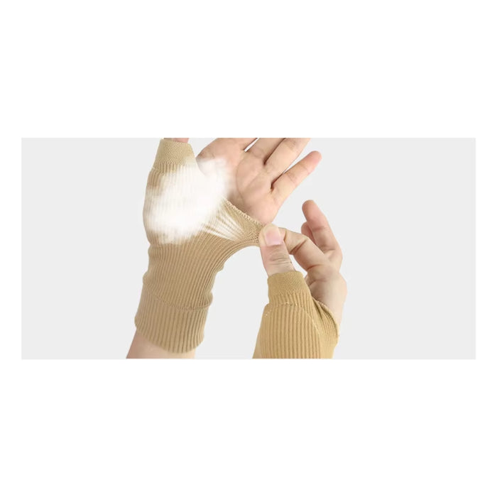Person wearing beige gloves on a white background