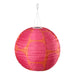 Pink and orange spherical paper lantern with a hanging hook on a white background