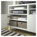 White storage cabinet with open door showing interior shelves and bins, on a striped floor.