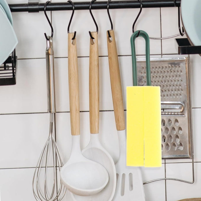 Yellow and green cup cleaning brush hanging on black kitchen rod among utensils – ideal for organized storage and quick access – 1598453485864 13972338