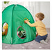 Child playing with a green play tent featuring stuffed animals inside.
