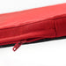 Detail view of STAGGSTARR zipper and stitching, revealing black inner lining beneath red fabric