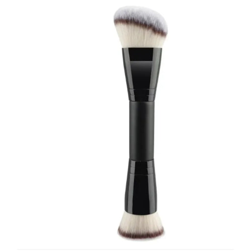 Makeup brush with black handle and white bristles on a white background