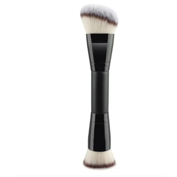 Makeup brush with black handle and white bristles on a white background