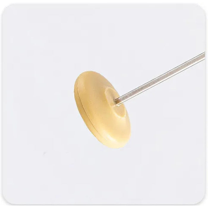 Round beige object on a white background