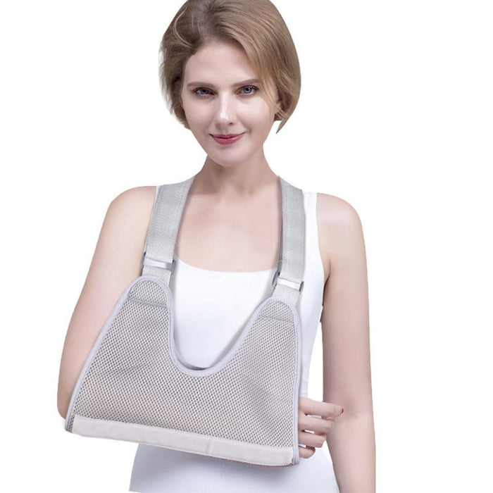 Padded arm sling support with adjustable straps for customized compression and comfort.