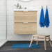 TOFTBO bath mat placed on bathroom floor, bright blue, 40x60 cm