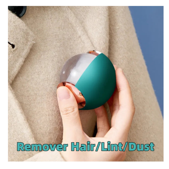 Hand holding a dual-colored ball with text 'Remover Hair/Lint/Dust' against a neutral background