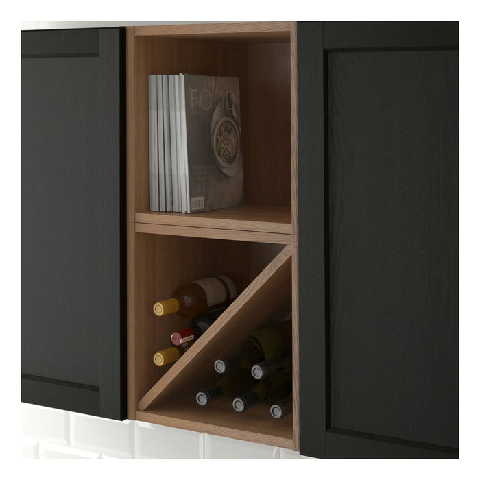 Wooden cabinet with black doors containing wine bottles and books.