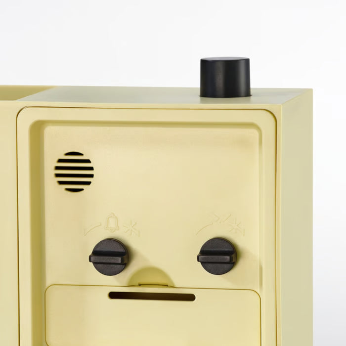 Beige safe with black accents on a white background