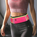 Waterproof running belt – pink with dual pockets and logo, worn over black leggings in gym setting