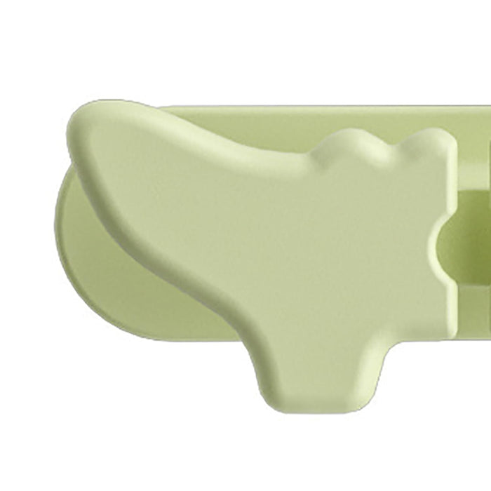 Light green ceramic bowl with a unique design on a white background
