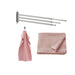 Towel rack with pink towels on a white background
