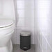n image of the waste bin in a bathroom setting: "Functional and Aesthetically Pleasing Waste Bin for Bathrooms - IKEA Dark Grey - 3L (1 Gallon). 00493912