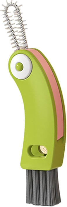 Green and pink brush with bristles on a white background