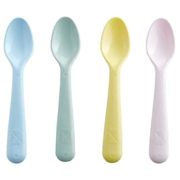 Four colorful spoons in pastel shades on a white background