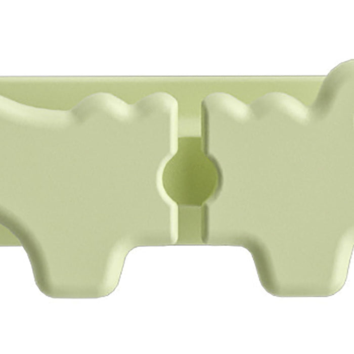 Light green plastic egg holder on a white background