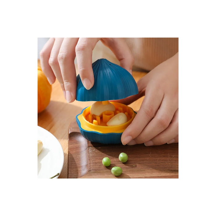 Blue and yellow kitchen tool being used on a wooden surface with a white background