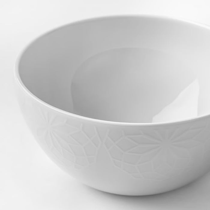 White ceramic bowl on a light gray background
