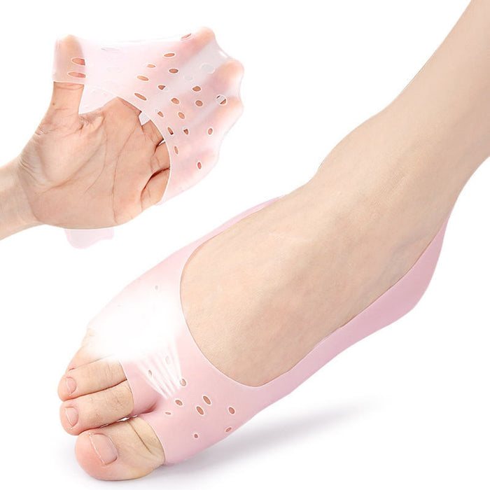  flexible pink silicone foot sleeve held in hand showing stretch
