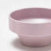 Close-up of SPJUTLILJA bowl in light purple geometric design, wide cylindrical upper section tapering to narrow base