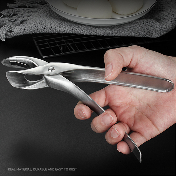 Kitchen utensil drawer with anti-scalding clip stored neatly inside