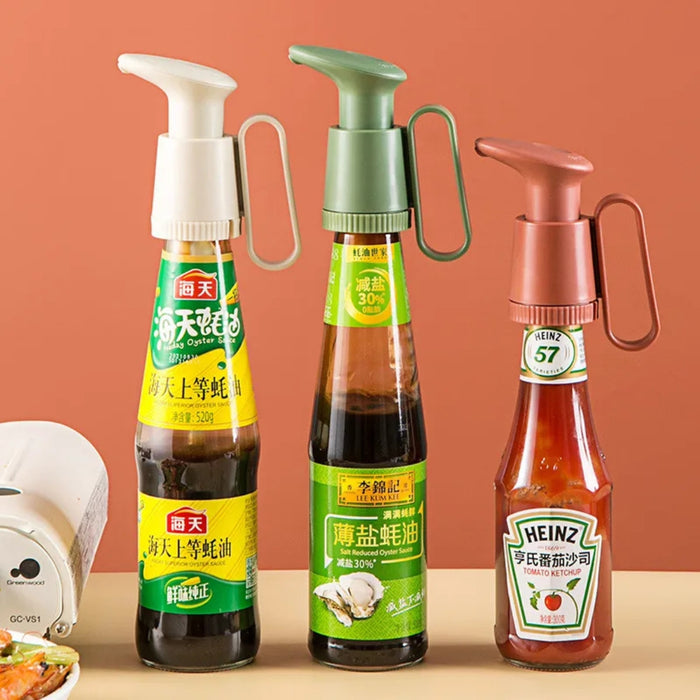 Three bottles with pump dispensers on a beige surface against an orange background