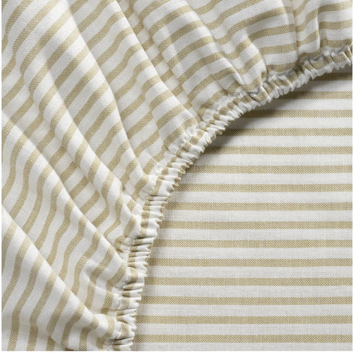 Close-up of beige and white striped fabric with a textured pattern